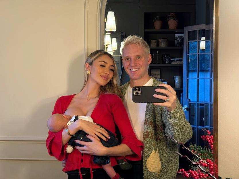 Sophie Habboo holds her newborn son Ziggy while Jamie Laing takes a selfie.