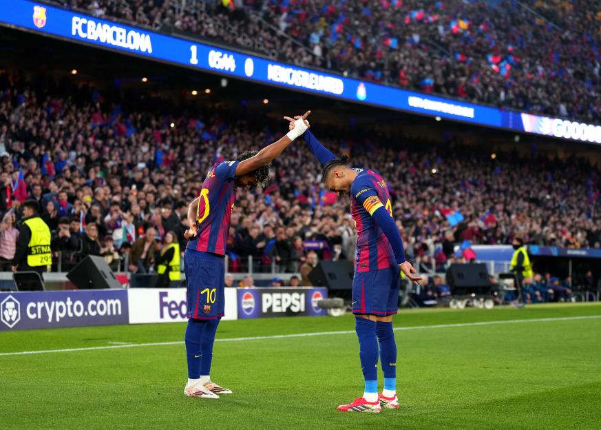 FC Barcelona's Raphinha celebrates his goal with teammate Lamine Yamal during their UEFA Champions League match against Newcastle United FC.