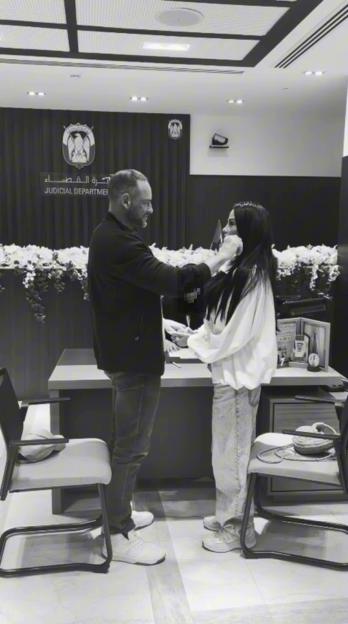 Katie Price and her new husband, Lee Andrews, exchanging vows at their wedding ceremony in Dubai.