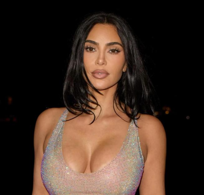 Kim Kardashian in a shimmering top.