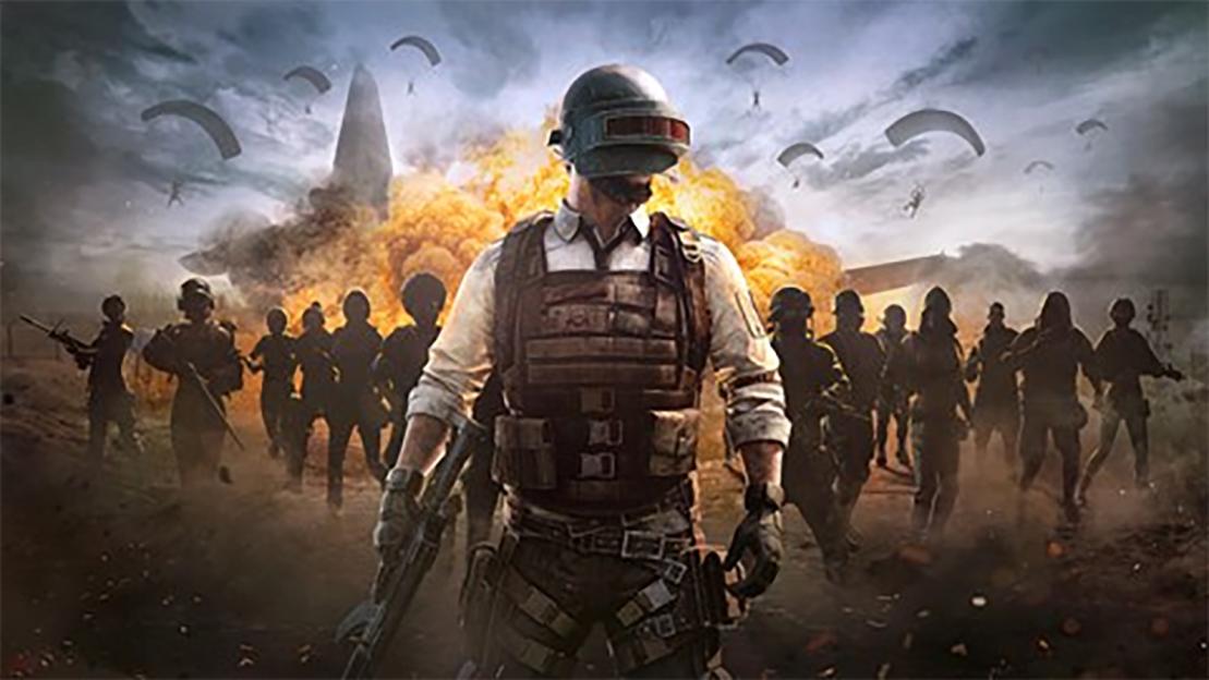 Illustration of a soldier with a helmet and tactical vest in front of an explosion, with other soldiers and parachutists in the background.