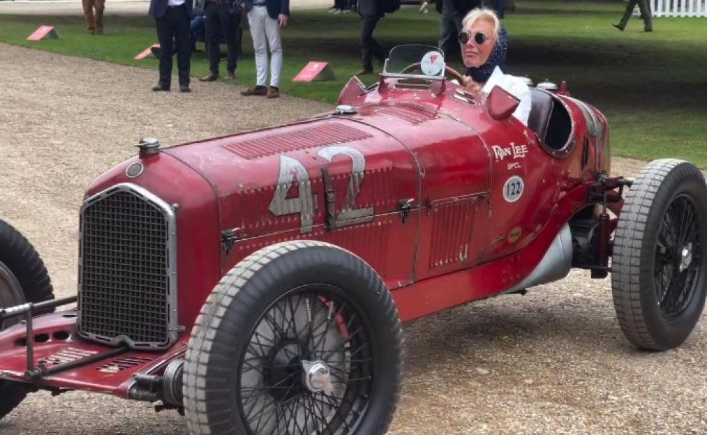 Jennifer Taylor driving a 1933 Alfa Romeo.
