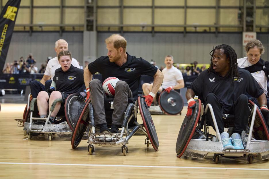 Prince Harry, Duke of Sussex and Ade Adepitan playing wheelchair rugby at the Invictus Games.