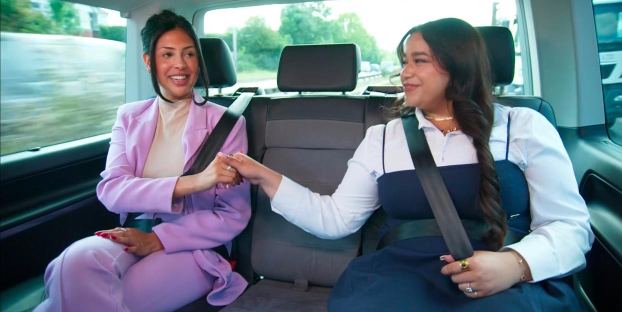Pascha Myhill and Karishma Vijay, candidates for The Apprentice 2026, hold hands while seated in a car.