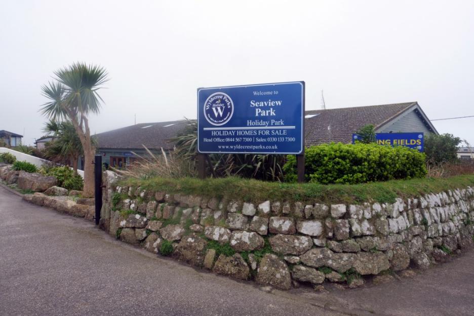 Sign for Seaview Park Holiday Park, advertising homes for sale.