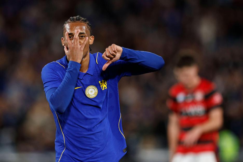 Joao Pedro of Chelsea celebrates scoring a goal during a match.