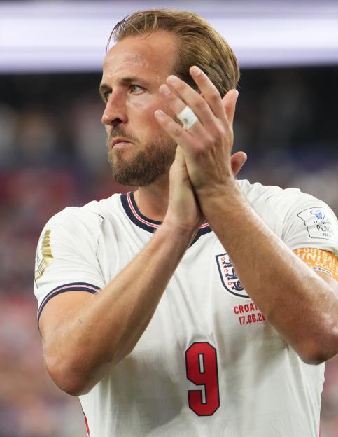 England's Harry Kane claps in his number 9 jersey during the FIFA World Cup 2026 match against Croatia.