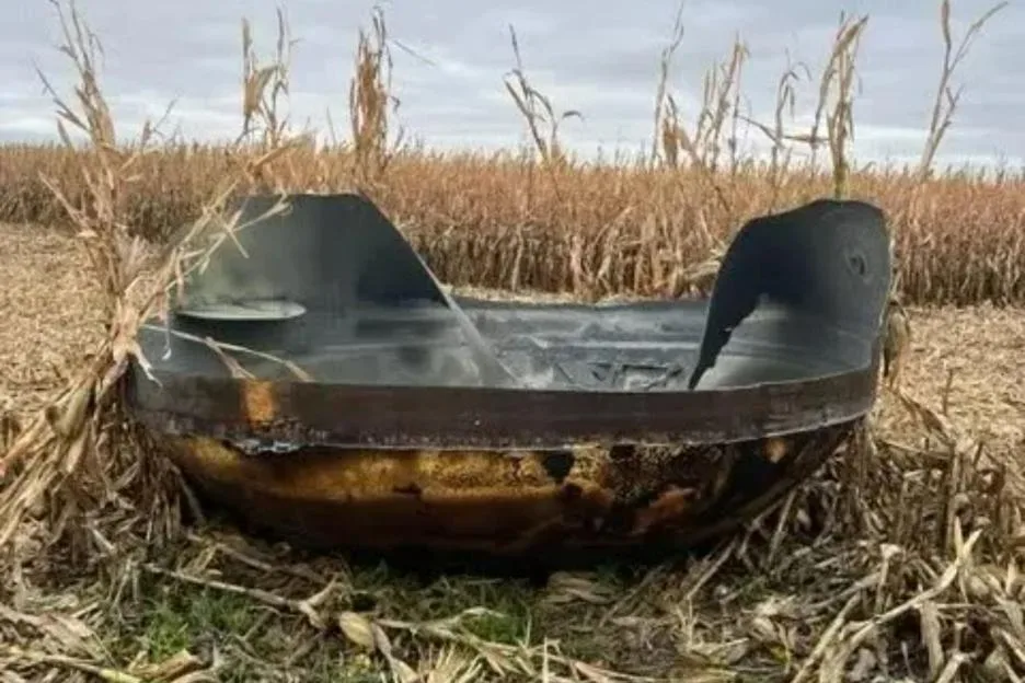 Smalltown cops baffled after 11-foot-wide metal space object crash lands in cornfield – can you work out what it is?