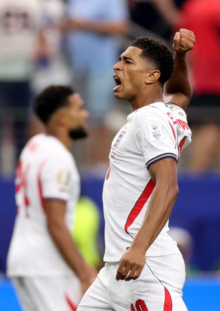 Jude Bellingham, wearing an England jersey, celebrates during a FIFA World Cup 2026 match.