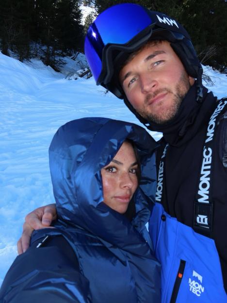 Paige Thorne and Drew posing for a selfie in the snow.