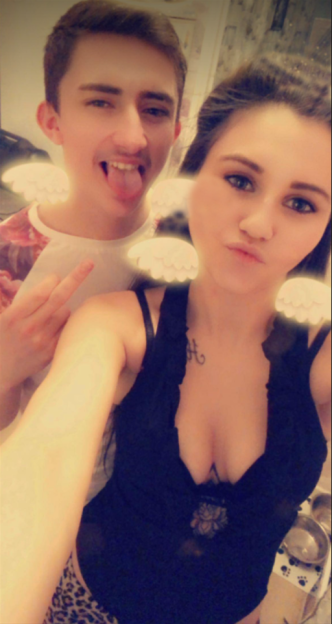 A man making a silly face and a woman pouting, both with angel wing filters.