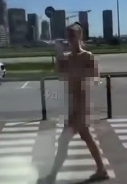 Russian blogger and former Dom-2 reality show contestant Anastasia Bragina, 22, detained after walking naked through Moscow streets and visiting a shop, faces up to six years in jail on pornography charges.