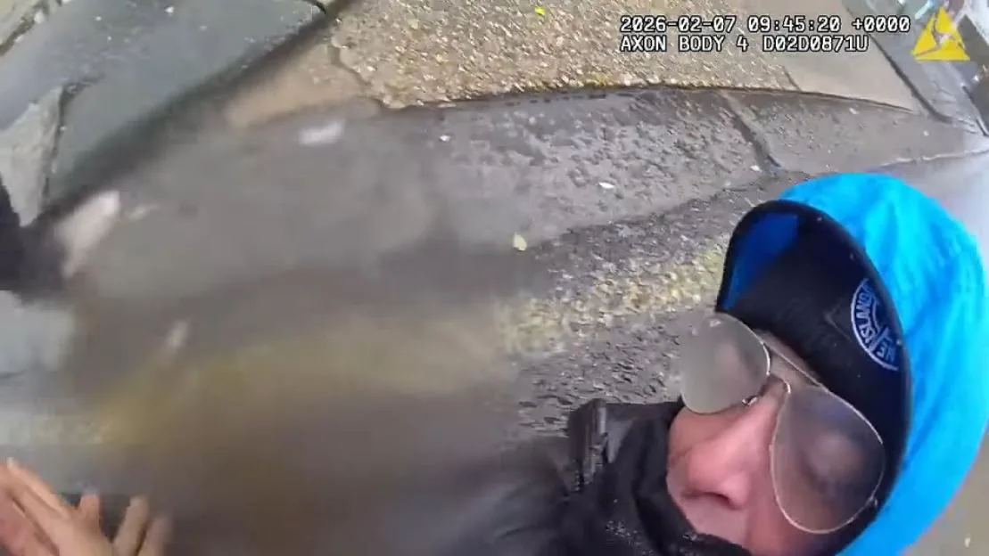 Body-worn camera footage of Kieran Mansfield on the ground during his arrest.