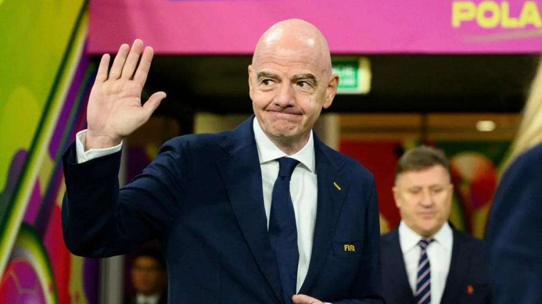FIFA President Gianni Infantino waves during the Winners' Ceremony.