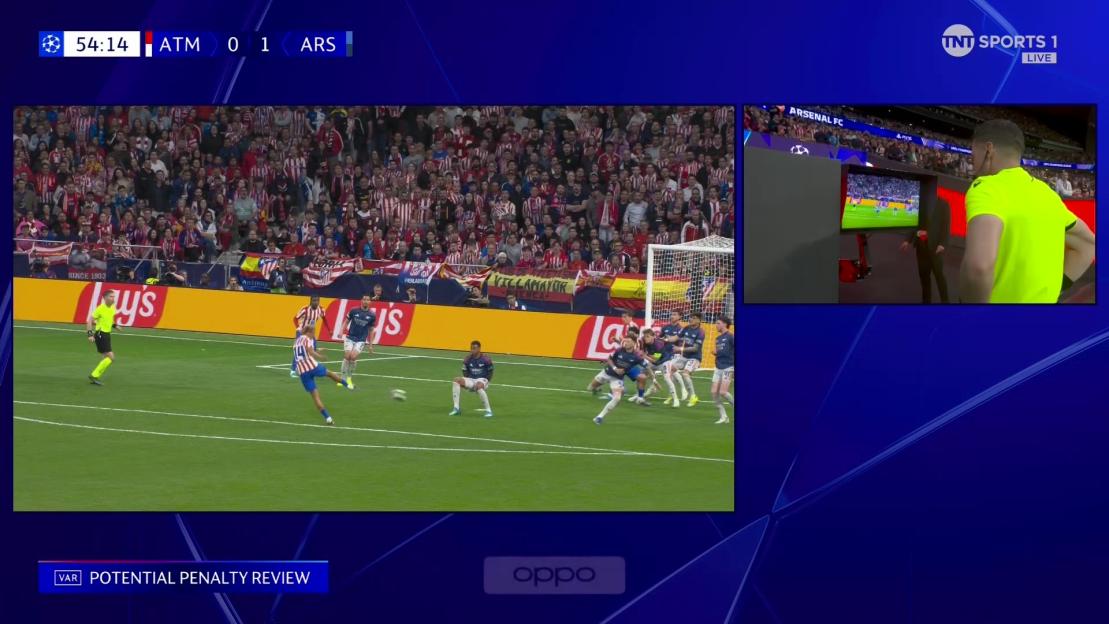 A split screen showing a soccer match with a player kicking the ball and a referee reviewing a play on a screen.