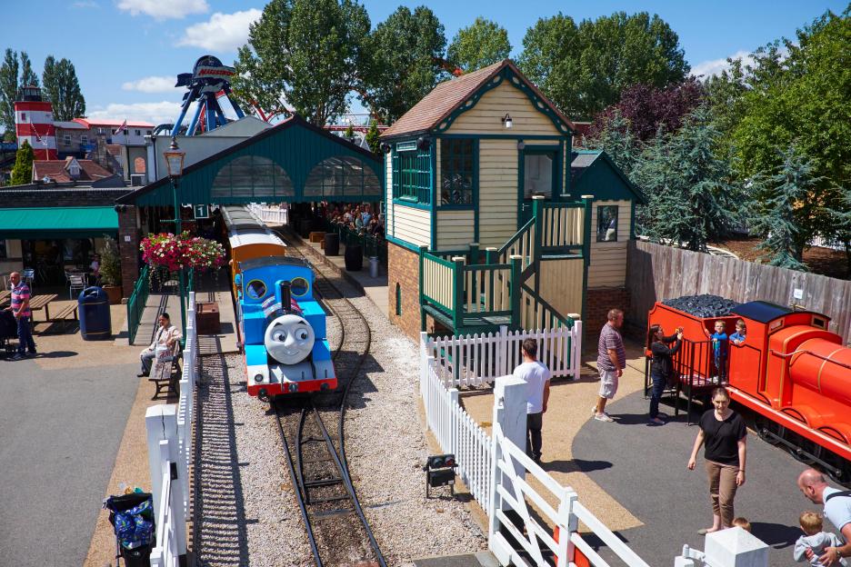 View over Thomas Land at Drayton Manor Theme Park, with the Thomas the Tank Engine ride and other park attractions visible.