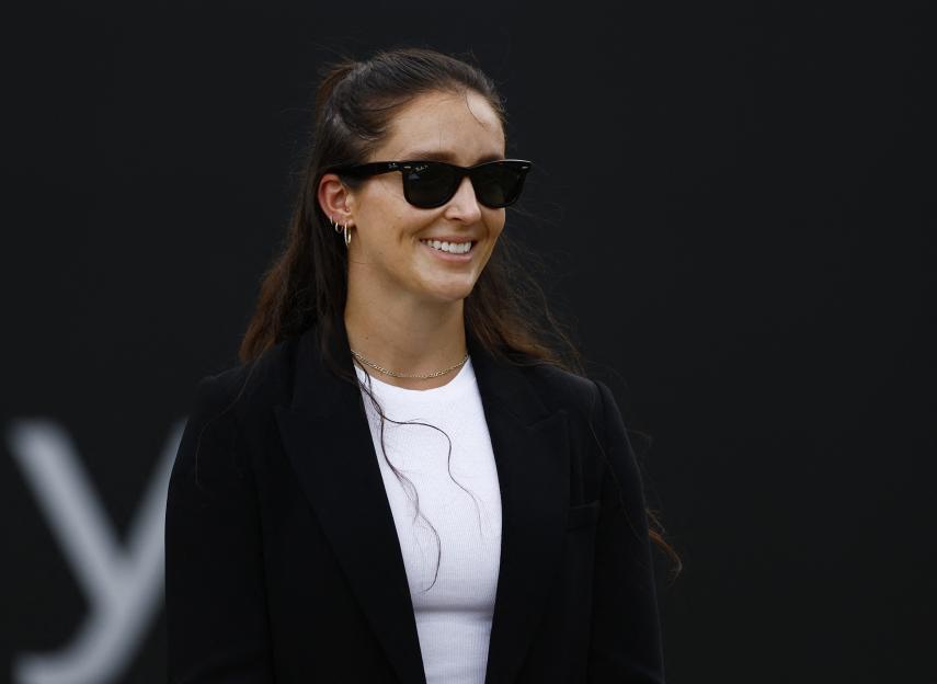 Laura Robson in sunglasses smiles during the Nottingham Open trophy presentation.