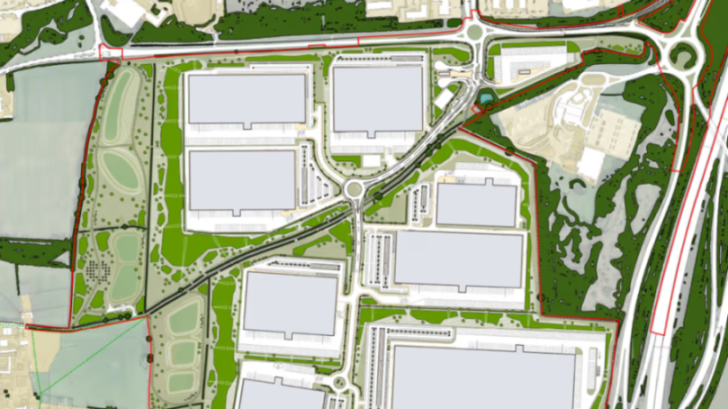 Illustration of a planned industrial complex with several large buildings, parking lots, and green spaces, bordered by roads and natural areas.