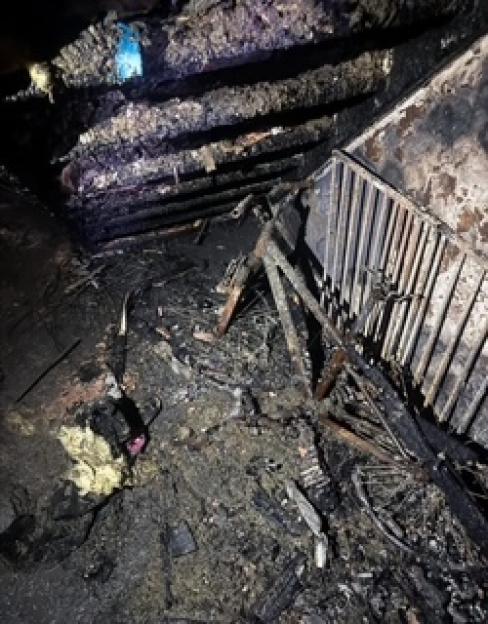 Burned remains of a home after an e-scooter fire.