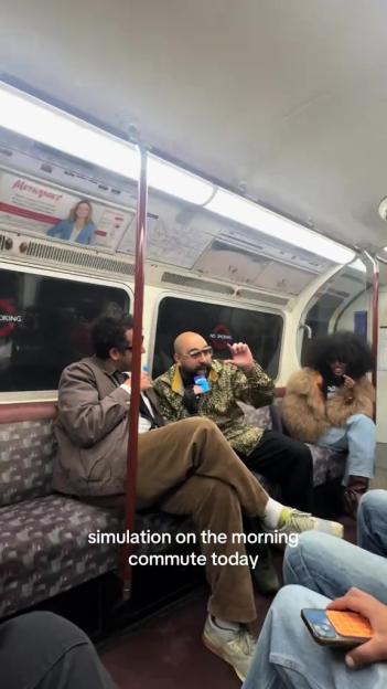 Comedians Chabuddy G and Allan Mustafa on the London Underground.
