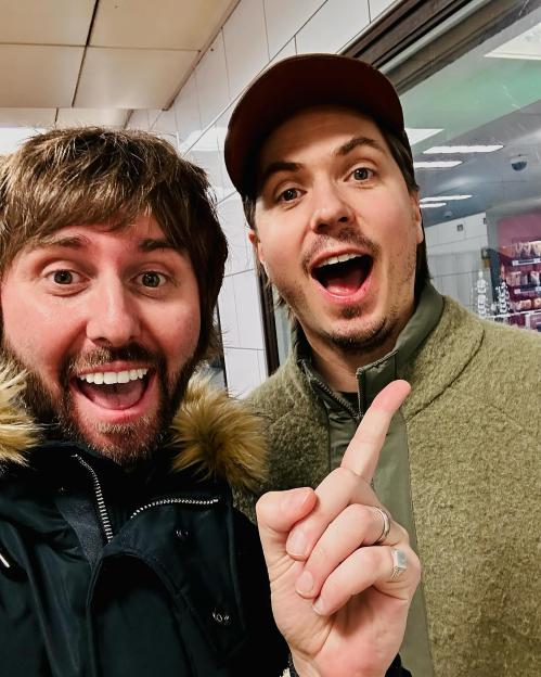 James Buckley and Joe Thomas smiling together in a reunion selfie.