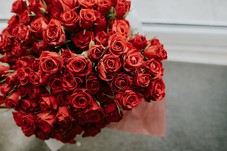 A large bouquet of red roses.