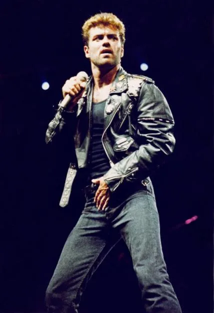 George Michael performing on stage during his 'Faith' tour.