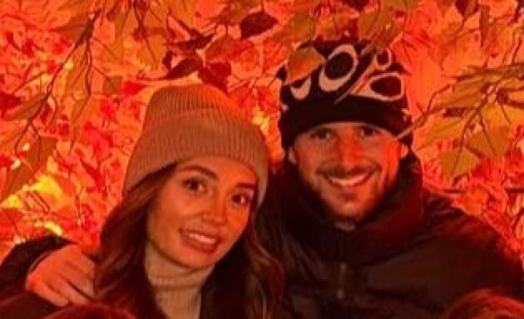 Family group photo with Mason Mount and Jordan Porter in a room decorated with autumn leaves.