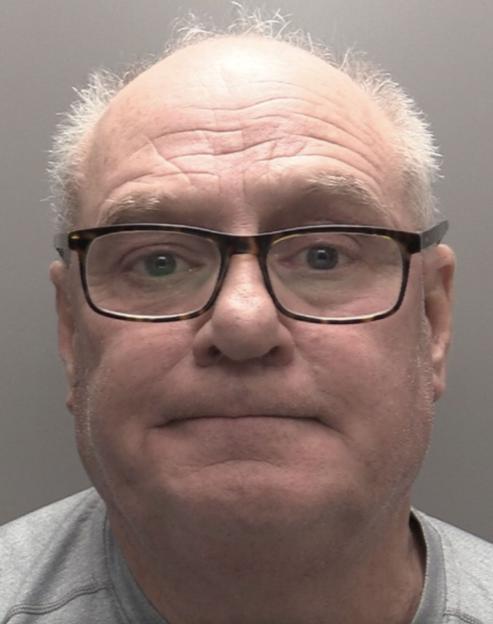 Mugshot of Francis Ventre, a balding white man with glasses, looking directly at the camera.