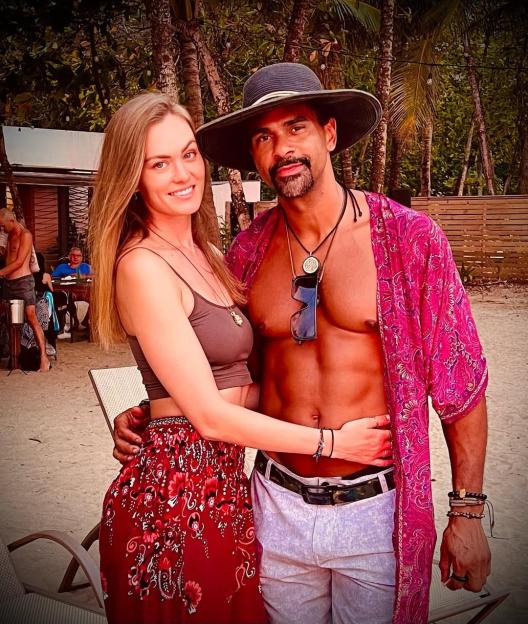 David Haye and Sian Osborne posing on a beach.