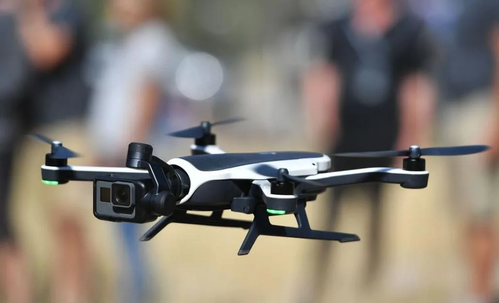 A GoPro Karma foldable drone in flight.