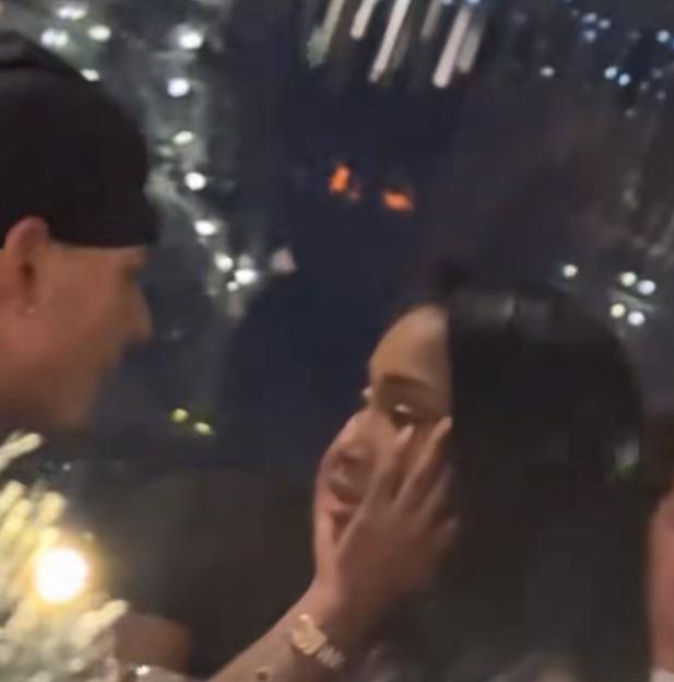 Two people are talking to each other, with a comment overlay that says 'Maybe they separated before... can't see her openly doing that in public'.