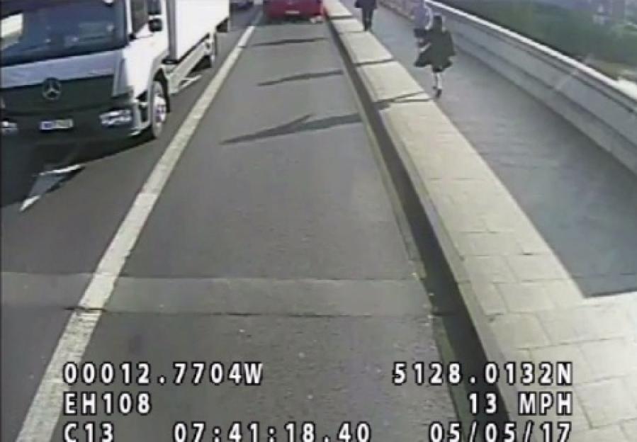CCTV footage shows a jogger approaching a woman on Putney Bridge.