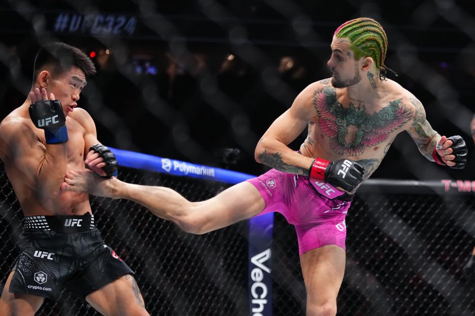 Sean O'Malley strikes Song Yadong in a bantamweight bout during UFC 324.