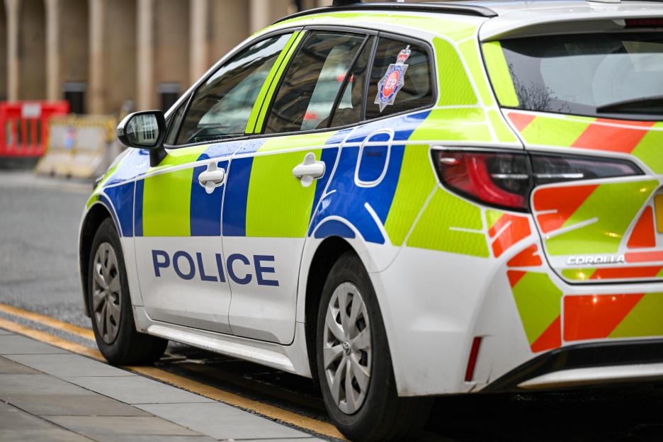 Greater Manchester Police emergency response car outside Manchester Town Hall.
