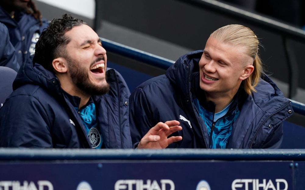 Manchester, UK. 13th May, 2026. Erling Haaland of Manchester City (r) jokes with Rayan Cherki of Manchester City (l) during the Manchester City vs Crystal Palace Premier League match at the Etihad Stadium, Manchester. Picture credit should read: Andr