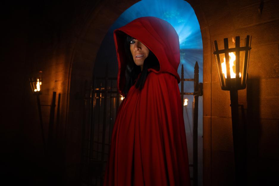 Claudia Winkleman in a red Traitor cloak.