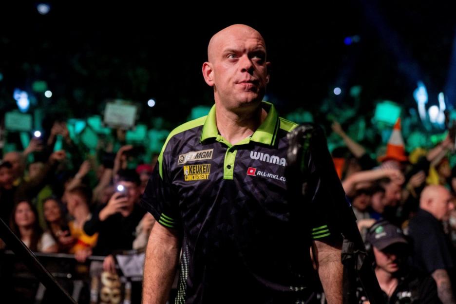 Michael van Gerwen walking on stage during the 2026 BetMGM Premier League Darts.