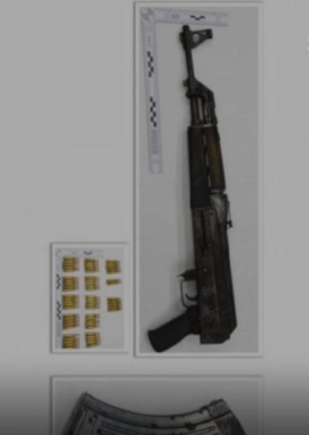 Collage of an assault rifle, bullets, and a magazine.