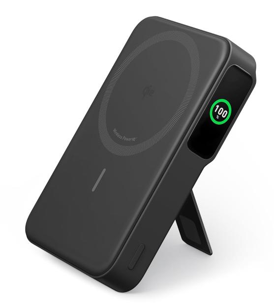 Black wireless charger with a 100% battery indicator.