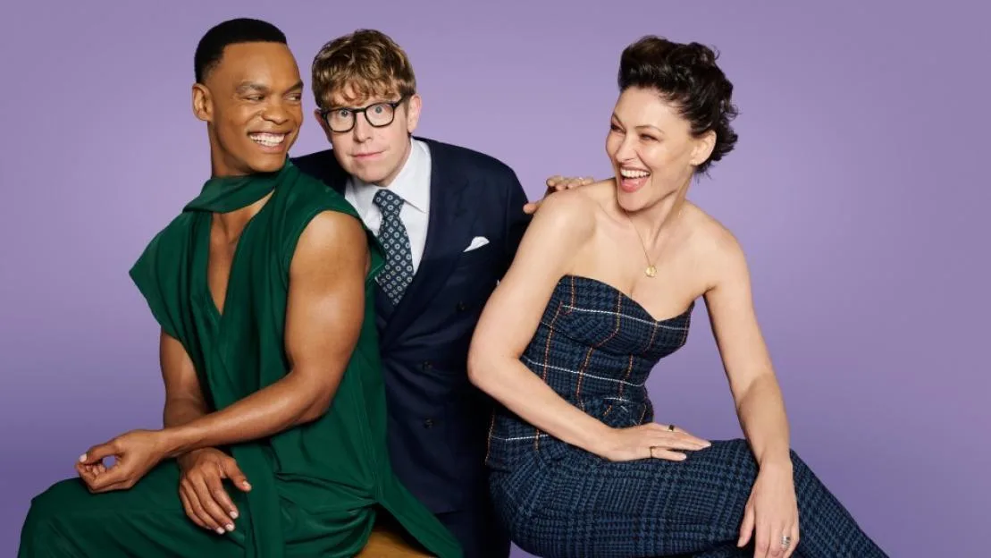Johannes Radebe, Josh Widdicombe, and Emma Willis posing.