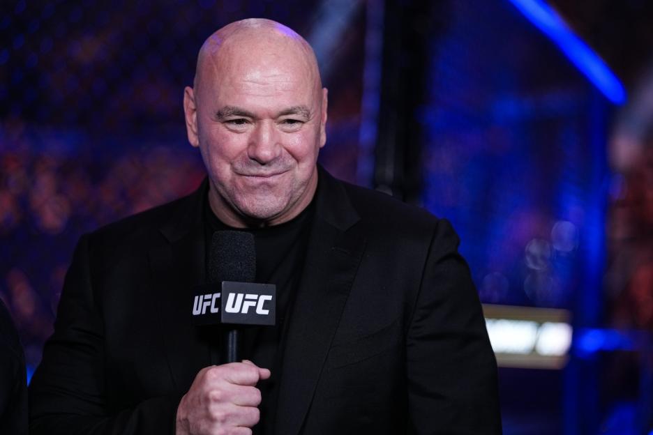 UFC President Dana White speaking into a microphone.