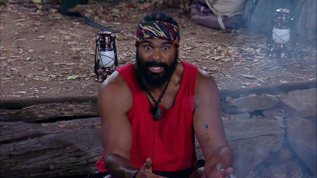 David Haye speaking in a red tank top and headband.