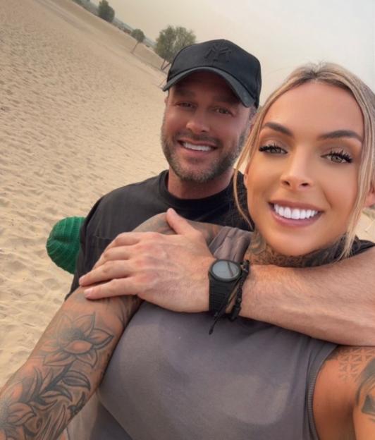 Lee Andrew and Alana Percival smiling in Dubai.