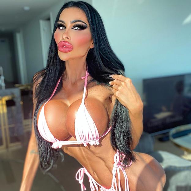 Tara Jayne in a pink bikini.