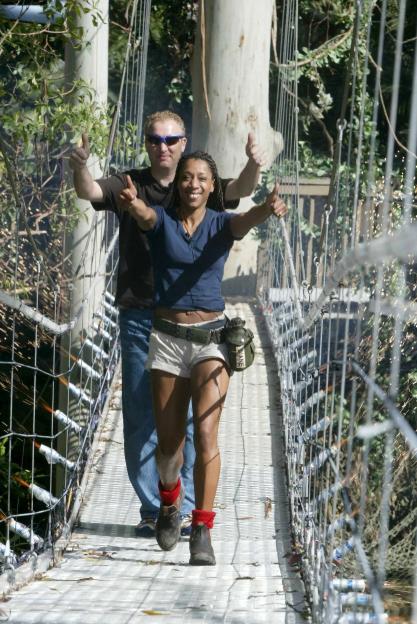 Diane Modahl and husband Vicente leaving "I'm a Celebrity Get Me Out of Here..." and giving thumbs up.