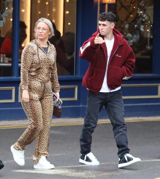 Man City Footballer Phil Foden dumps his car on double yellow lines, as he goes ring shopping with Fiancee Rebecca Cooke, as she rocks a Cat Slater lepoard print tracksuit in Wilmslow Cheshire