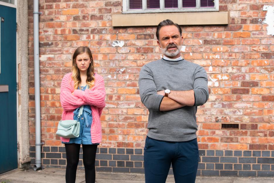 Billy Mayhew and Summer Spellman standing with arms crossed, looking concerned.