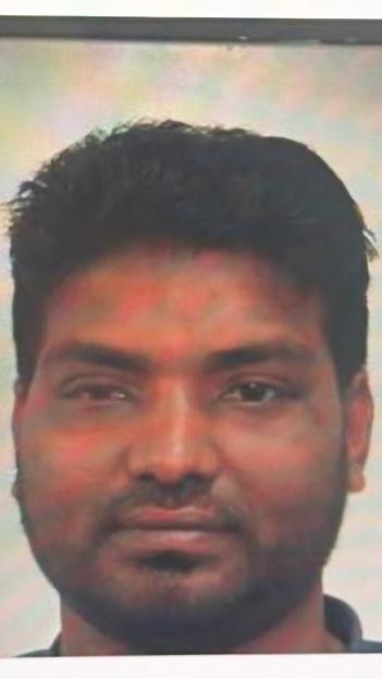 Mugshot of Shahadat Hossain, a wanted man.