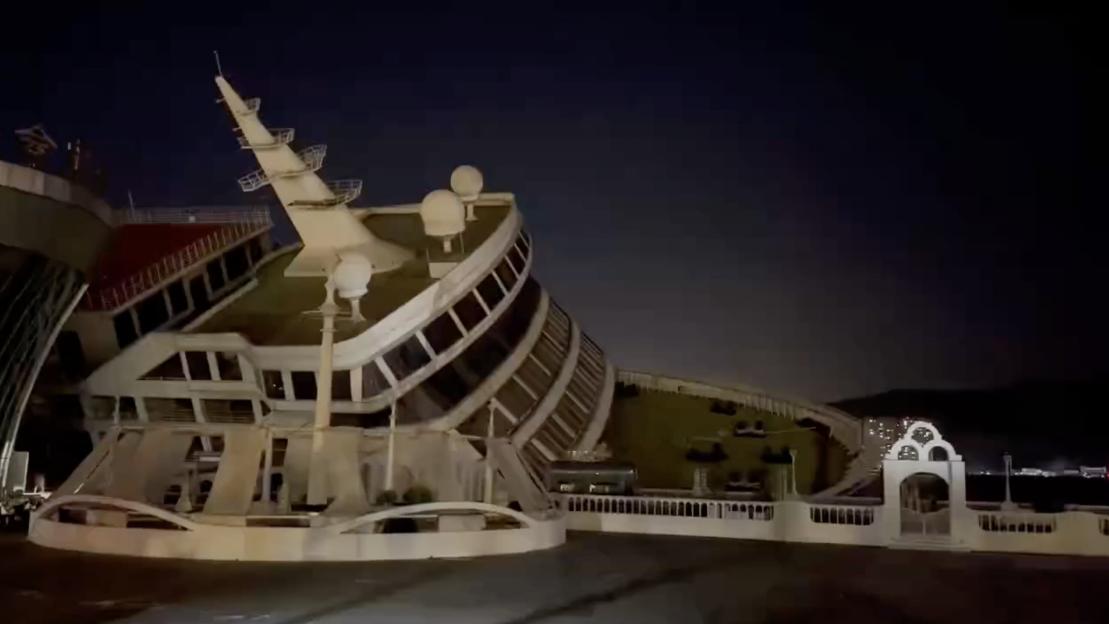 VIDEO: Luxury cruise ship topples over at dock after typhoon hits